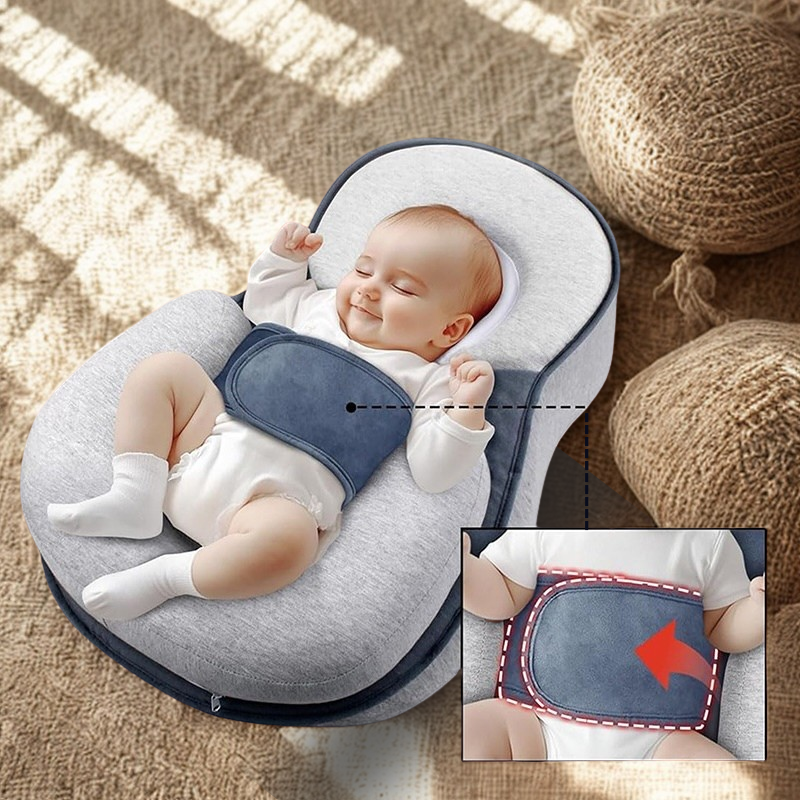 Détail ceinture ajustable sécurisée coussin bébé, maintien optimal et confort durant repos et alimentation