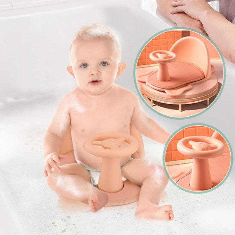 Bébé dans siège de bain rose en position sécurisée - dossier ergonomique et volant ludique