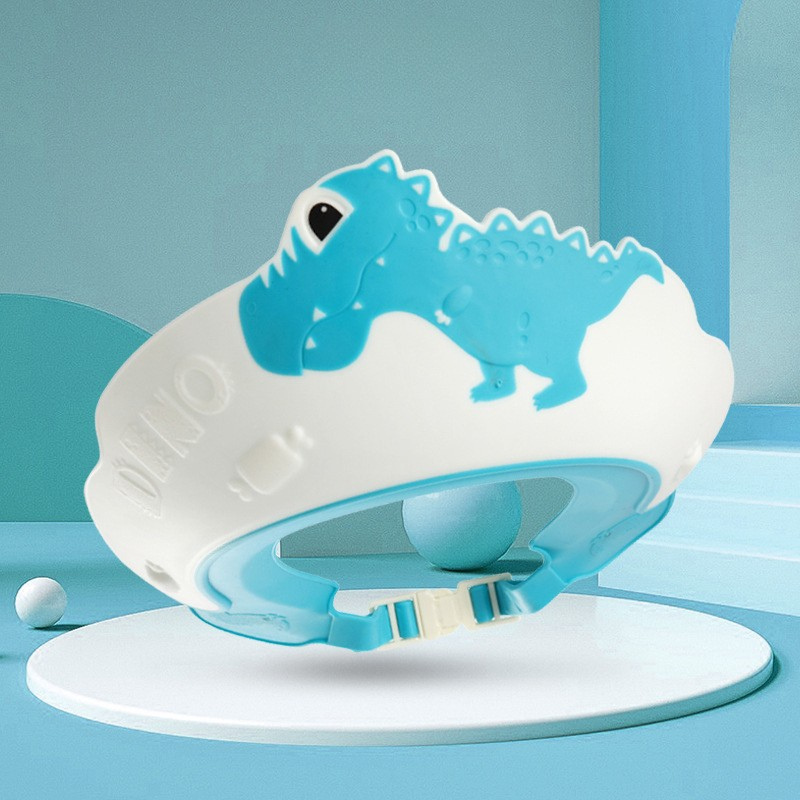 Bonnet de bain bébé Dino des Mers bleu océan, design dinosaure en relief, visière protectrice pour yeux et oreilles