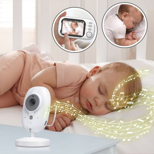 Camera bebe avec fonction berceuse surveillant un bébé endormi dans son lit, écran de contrôle vidéo intégré