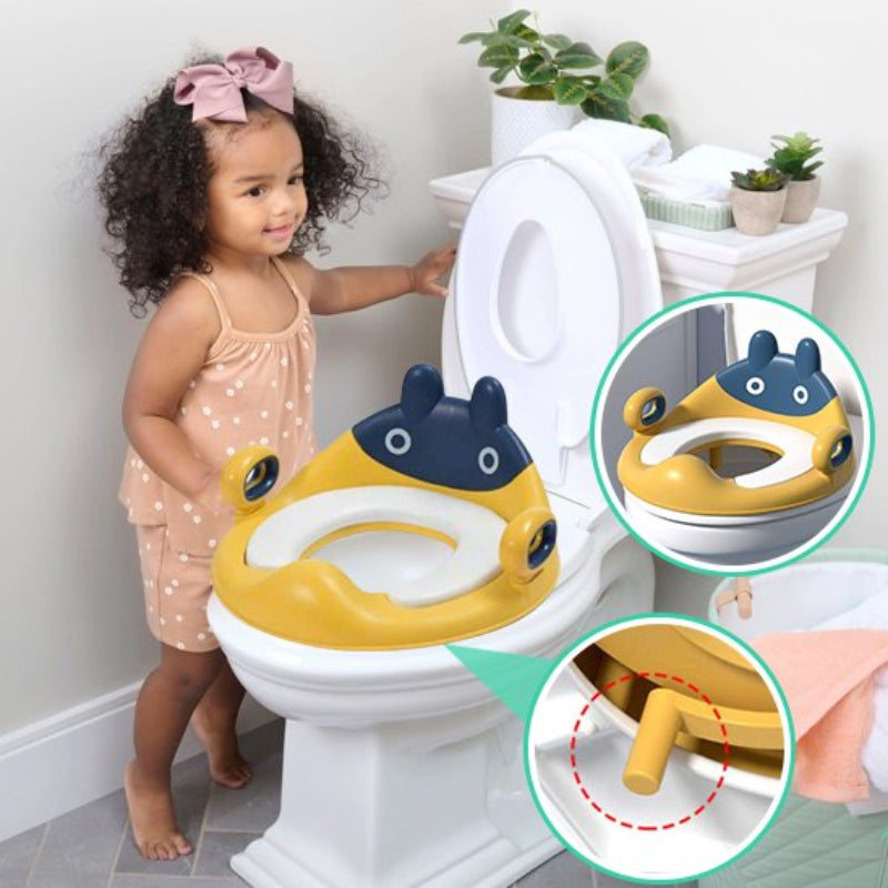 Réducteur de toilette enfant design animal jaune et bleu, fillette aux cheveux bouclés, système d'attache sécurisé